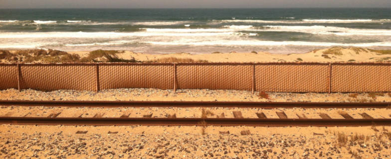 Train Tracks by a Beach